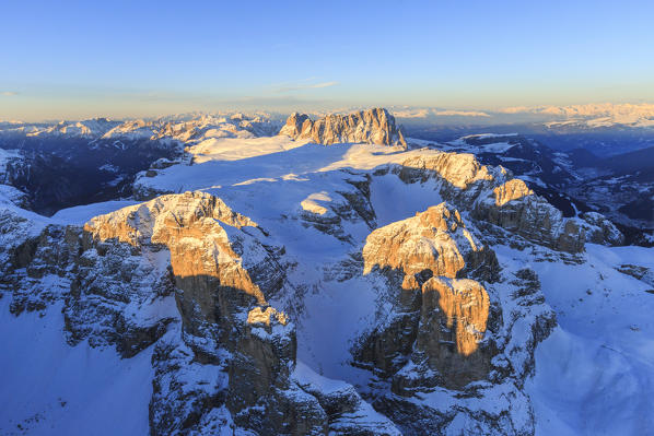 Aerial view of Sassolungo and Grohmann peak at sunset. Dolomites Sella Group Trentino Alto Adige Italy Europe