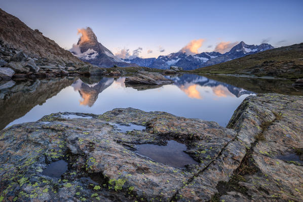 Matterhorn reflected in Lake Stellisee at dawn Zermatt Pennine Alps Canton of Valais Switzerland Europe