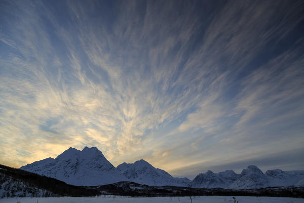 Clouds over the snowy landscape of Svensby Lapland Lyngen Alps Tromsø Norway Europe