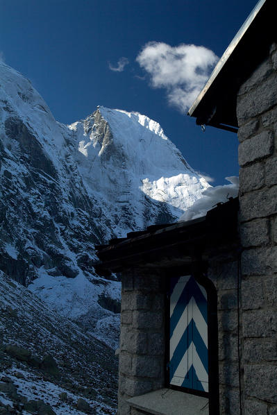 Refuge at Sciora and the peak of Badile.  Bregaglia Valley Switzerland Europe