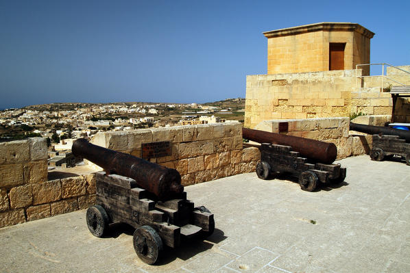 Overlooking the fortifications and cannons in the Citadel, Victoria, the capital of Gozo, an island of the Maltese archipelago in the Mediterranean Sea Europe