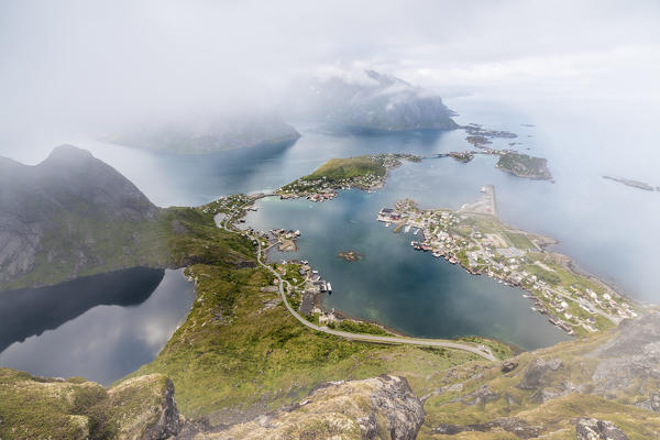 Top view of lakes and sea under the cloudy sky at summer Reinebringen Moskenes Lofoten Islands Norway Europe