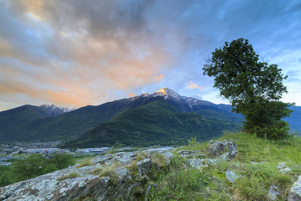 Pink clouds at dawn on the ancient Fort Fuentes framed by Monte Legnone Colico Lecco province Lombardy Valtellina Italy Europe