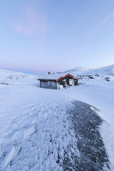 Isolated house in fields of ice and snow, Riksgransen, Abisko, Kiruna Municipality, Norrbotten County, Lapland, Sweden