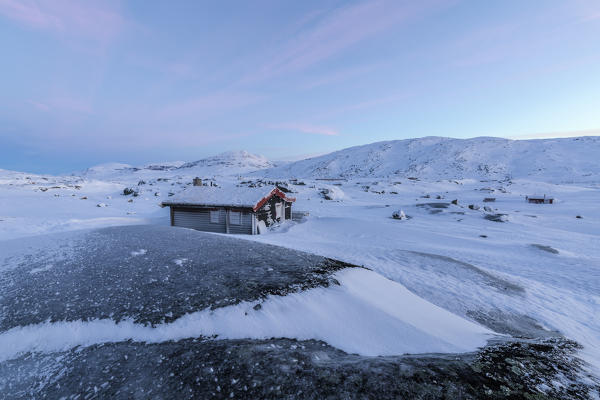 Isolated house in fields of ice and snow, Riksgransen, Abisko, Kiruna Municipality, Norrbotten County, Lapland, Sweden