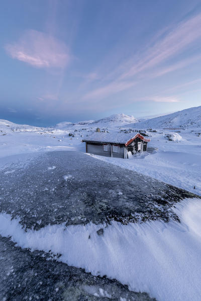 Isolated house in fields of ice and snow, Riksgransen, Abisko, Kiruna Municipality, Norrbotten County, Lapland, Sweden