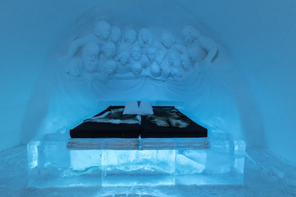 Illuminated double bed and sculptures, Ice Hotel, Jukkasjarvi, Kiruna, Norrbotten County, Lapland, Sweden