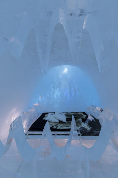 Illuminated double bed and sculptures, Ice Hotel, Jukkasjarvi, Kiruna Municipality, Norrbotten County, Lapland, Sweden