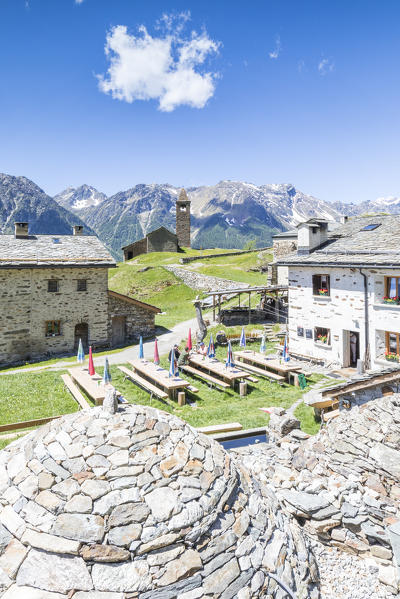 Mountain retreat and old stone caves called Crotto, San Romerio Alp, Brusio, Canton of Graubünden, Poschiavo valley, Switzerland