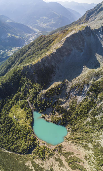 Panoramic of turquoise Lago Lagazzuolo from drone, Chiesa In Valmalenco, Province of Sondrio, Valtellina, Lombardy, Italy