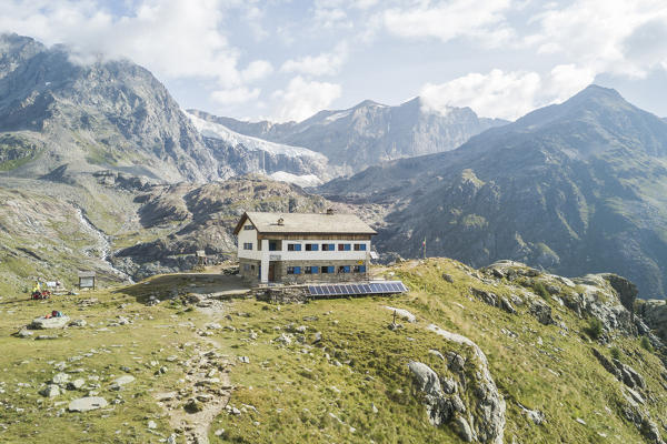 Aerial view of Rifugio Bignami and Fellaria Glacier on the background, Malenco Valley, Valtellina, Lombardy, Italy