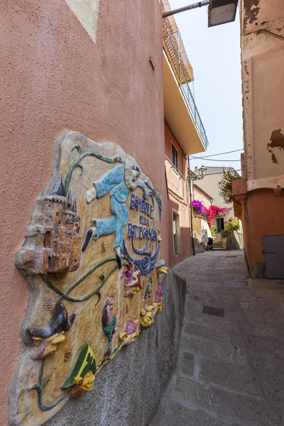 Decorated wall of old alley, Porto Azzurro, Elba Island, Livorno Province, Tuscany, Italy