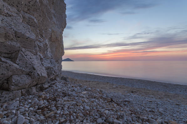 Sunset on white cliffs of Sottobomba Beach, Portoferraio, Elba Island, Livorno Province, Tuscany, Italy