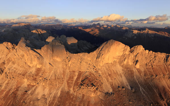 Aerial view of the rocky peaks of Roda Di Vael at sunset, Catinaccio Group (Rosengarten), Dolomites, South Tyrol, Italy