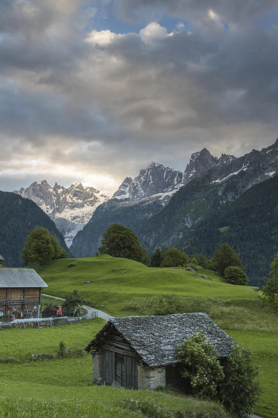 Clouds at dawn, Soglio, Bregaglia Valley, Maloja Region, Canton of Graubunden, Switzerland