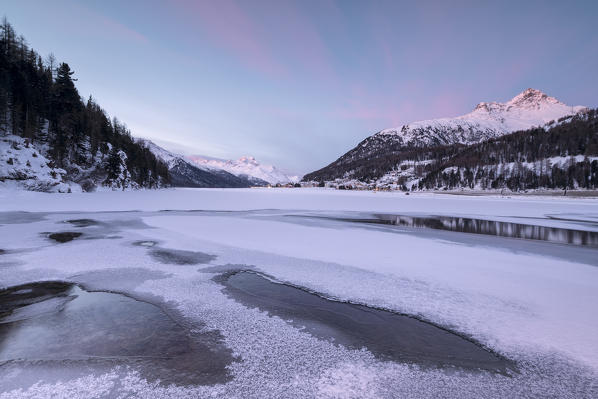 Piz Julier and Piz Da La Margna seen from frozen Lake Champfer, Silvaplana, canton of Graubunden, Engadin, Switzerland