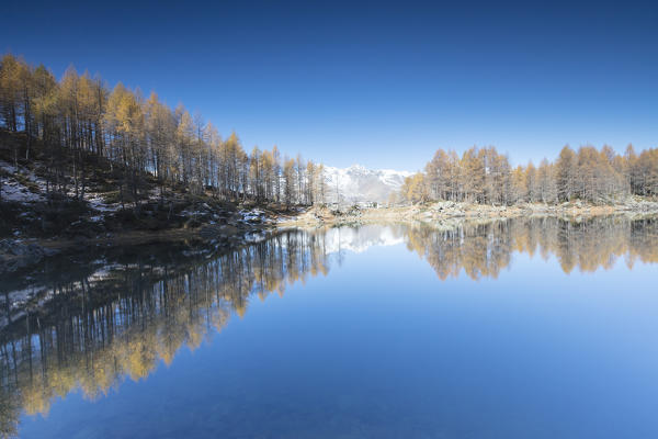 Lago Azzurro during autumn, Spluga Valley, province of Sondrio, Valtellina, Lombardy, Italy