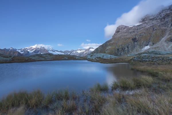 Alpine lake with Monte Disgrazia on background, Alpe Fora, Malenco Valley, province of Sondrio, Valtellina, Lombardy, Italy