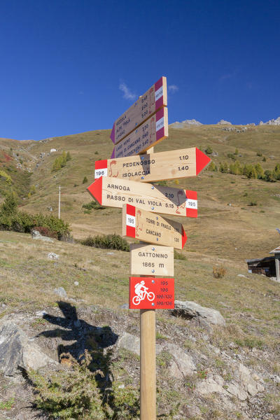 Hiking signage of Stelvio National Park, Val Vezzola, Valdidentro, Valtellina, Sondrio province, Lombardy, Italy