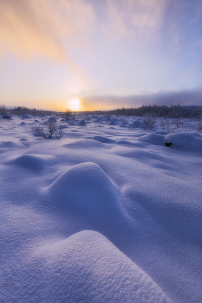 Colorful dusk in the snowy landscape, Muonio, Lapland, Finland