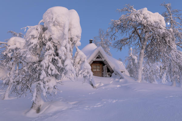 Typical wood chalet called Pallas Kota inside Pallas-Yllastunturi National Park, Muonio, Lapland, Finland