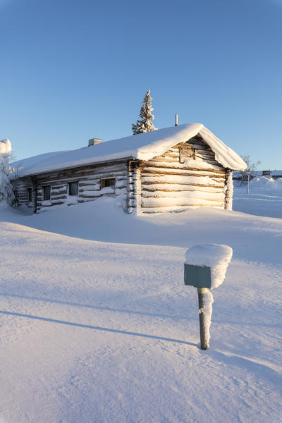 Wood chalet in the snow, Pallas-Yllastunturi National Park, Muonio, Lapland, Finland