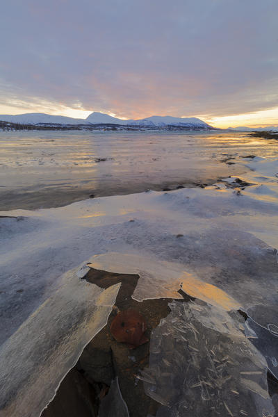 Sunset on frozen sea, Troms, Norway