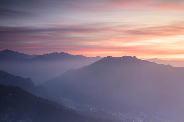 Overview of Valsassina at sunrise from Monte Coltignone, Lecco, Lombardy, Italy