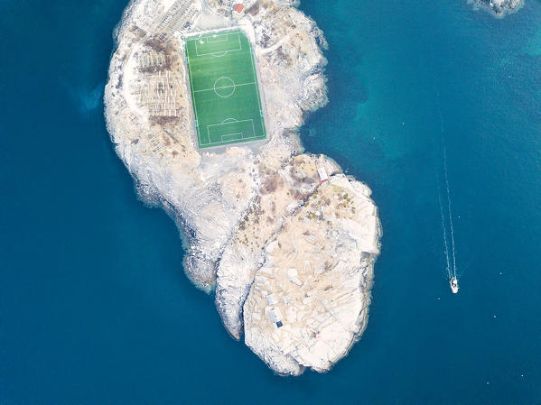 Aerial view of soccer field on islet, Henningsvaer, Vagan municipality, Lofoten Islands, Norway