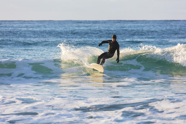 Surfing at Unstad, Vestvagoy, Lofoten Islands, Norway