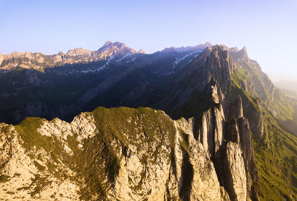 Aerial panoramic of the rocky peak Santis from Schafler at sunset, Appenzell Innerrhoden, Switzerland