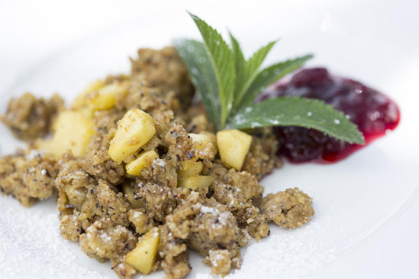 a traditional cake on Sarntal with buckwheat, apples, sugar and marmelade, Bolzano province, South Tyrol, Trentino Alto Adige, Italy