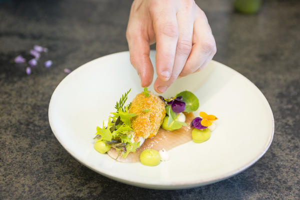 the mise en place of salmon with fried zucchini, bolzano province, south tyrol, trentino alto adige, italy