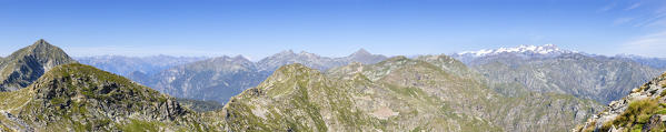 Panoramic view from the summit of the Monte Camino on the mountains of Biella above Oropa: the Matterhorn and the Monte Rosa on background. (Oropa Valley, Biella, Biella province, Piedmont, Italy, Europe)
