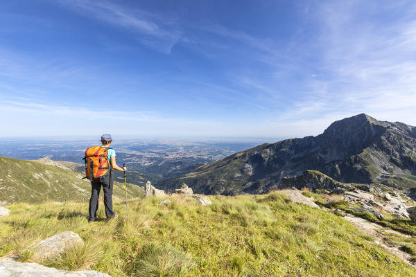 A girl is watching Biella and the Oropa Valley (Oropa, Biella, Biella province, Piedmont, Italy, Europe)