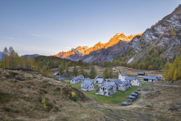 The Alp Crampilo at dawn in autumn season, Alpe Veglia and Alpe Devero Natural Park (Alpe Devero, Baceno, Antigorio Valley, Verbano Cusio Ossola province, Piedmont, Italy, Europe)