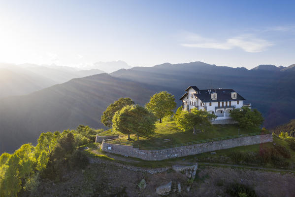 The Sanctuary of San Bernardo in the Oasi Zegna natural area, in the background the Monte Rosa (Valdilana, Biella province, Piedmont, Italy, Europe)