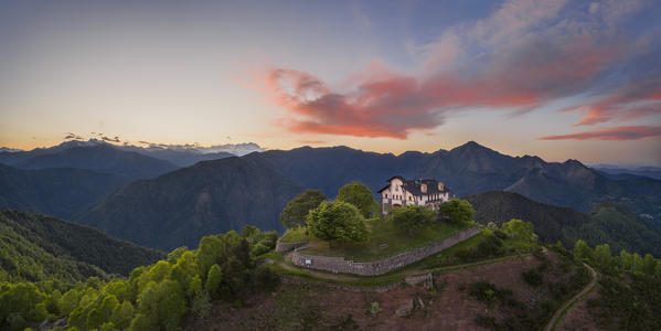 The Sanctuary of San Bernardo and the Sessera Valley at sunset, in the background the Monte Rosa (Oasi Zegna natural area, Valdilana, Biella province, Piedmont, Italy, Europe)