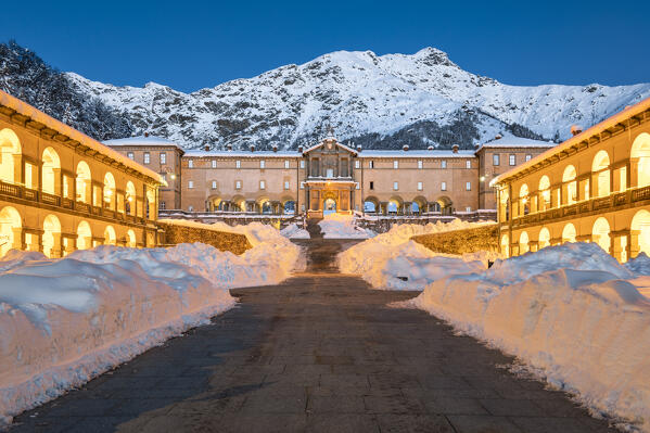 Entering in the Marian Sanctuary of Oropa after an heavy snowfall at morning twilight (Biella, Biella province, Piedmont, Italy, Europe)