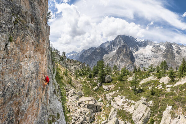 Climbing in front of the Mont Blanc Massif (Mont Chetif, Veny Valley, Courmayeur, Aosta province, Aosta Valley, Italy, Europe) (MR)