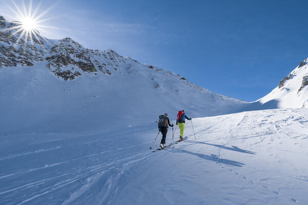 Ski touring to the Col Serena (Saint-Rhémy-en-Bosses, Gran San Bernardo Valley, Aosta province, Aosta Valley, Italy, Europe) (MR)