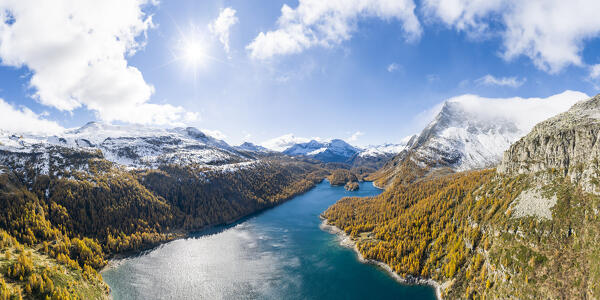 Panoramic aerial view of the Lake of Devero in autumn (Alpe Devero, Alpe Veglia and Alpe Devero Natural Park, Baceno, Verbano-Cusio-Ossola province, Piedmont, Italy, Europe)