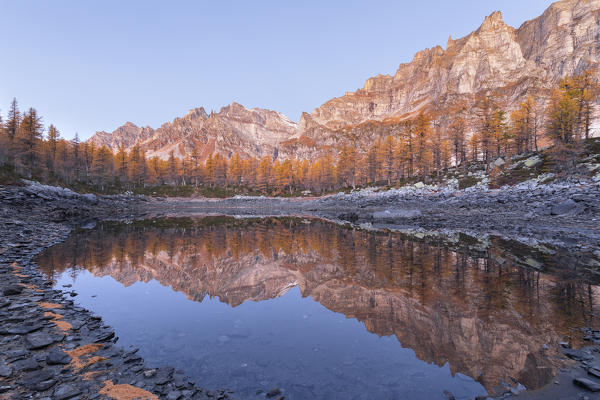 The Nero Lake in autumn before sunrise (Buscagna Valley, Alpe Devero, Alpe Veglia and Alpe Devero Natural Park, Baceno, Verbano Cusio Ossola province, Piedmont, Italy, Europe)