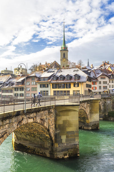 Two runners cross the bridge over the Aare river. Bern, Canton of Bern, Switzerland, Europe.