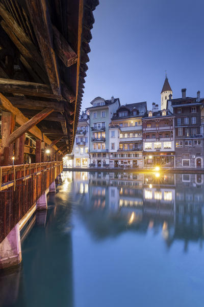 Traditional houses are reflected in the Aare river. Thun, Canton of Bern, Switzerland, Europe.