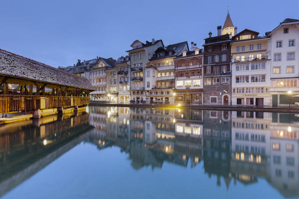 Traditional houses are reflected in the Aare river. Thun, Canton of Bern, Switzerland, Europe.