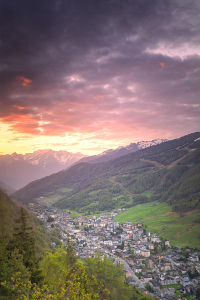 Sunrise on the village from above. Aprica, Orobie Alps, Valtellina, Lombardy, Italy, Europe