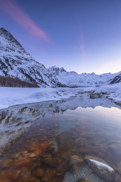 Sunset in the Val Roseg in winter. Pontresina, Val Roseg, Engadine, Canton of Grisons, Switzerland, Europe.