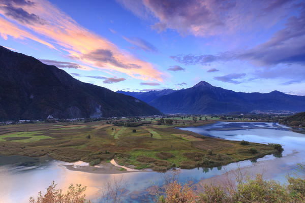 Sunrise above the Pian di Spagna reserve. Novate Mezzola Lake, Valchiavenna, Valtellina, Lombardy, Italy, Europe.