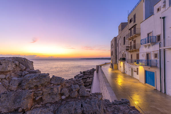 Sunrise on the seashore of Monopoli, Apulia, Italy, Europe.